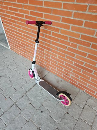 Patinete Oxelo rosa y blanco