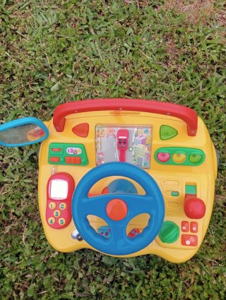 Juguete interactivo de coche con volante