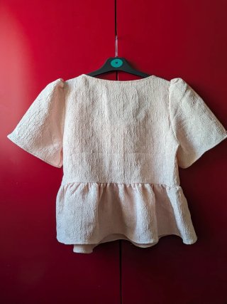 Blusa H&M rosa con volantes