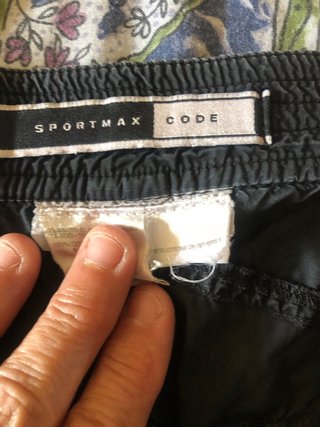 Pantalones grises con cremallera