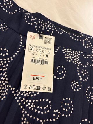 Falda plisada Zara azul con estampado