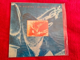 4 LPs del grupo Dire Straits