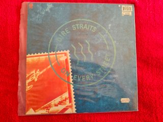 4 LPs del grupo Dire Straits