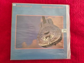 4 LPs del grupo Dire Straits
