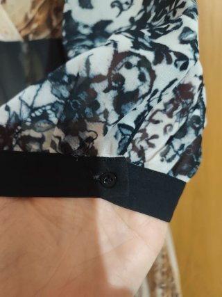 Vestido largo estampado plumas