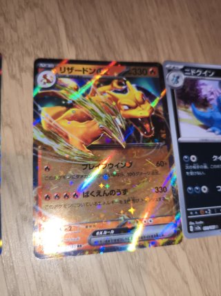 Cartas Pokémon: Machamp, Charizard, Nidoqueen