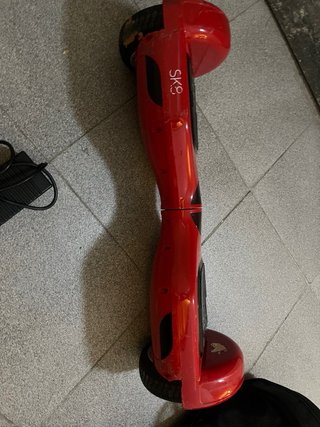 Hoverboard con funda y cargador.