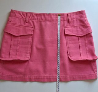 Falda mini rosa con bolsillos cargo | Talle bajo