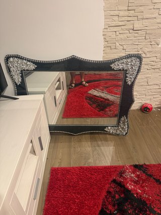 Espejo decorativo negro y plateado