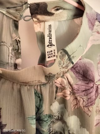 Blusa estampada flores y aves