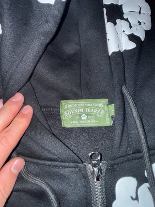 Sudadera Denim Tears con cremallera y estampado