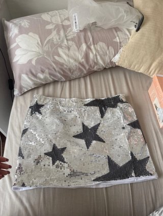 Falda lentejuelas estrellas plateadas