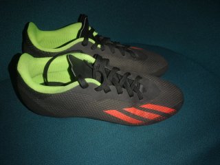 Botas de fútbol Adidas Negras y Naranjas