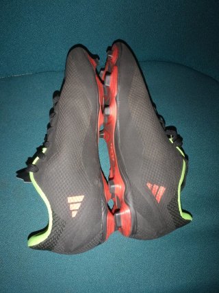 Botas de fútbol Adidas Negras y Naranjas