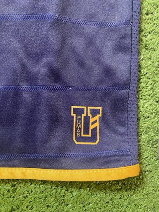 Camiseta Pumas UNAM Puma Visitante Azul/Dorado
