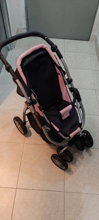 Cochecito de muñecas rosa y negro