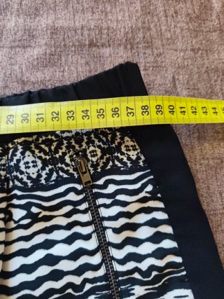 Pantaloni slim Mango fantasia
