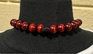 Collar de bolas de madera