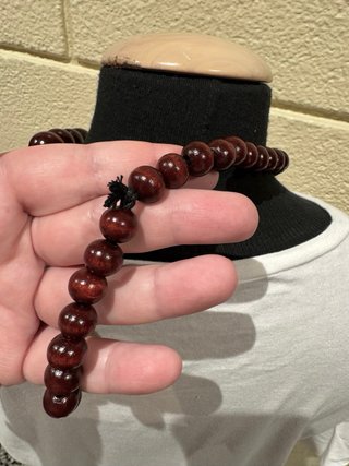 Collar de bolas de madera