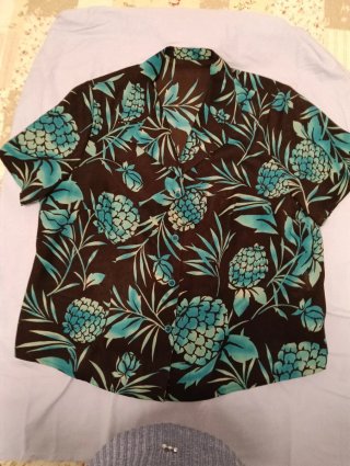 Blusa estampada floral marrón y turquesa