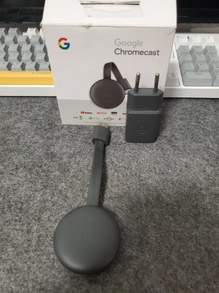 Google Chromecast con adaptador de corriente