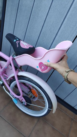 Bicicleta infantil rosa con silla para muñeco