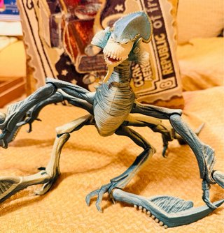 Muñeco dinosaurio articulado