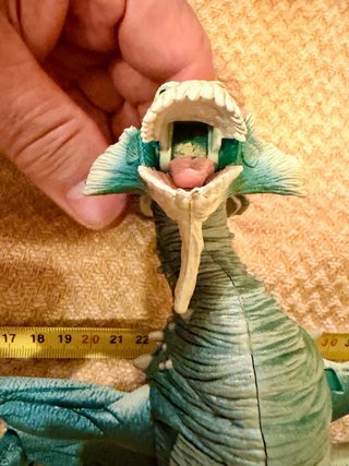 Muñeco dinosaurio articulado