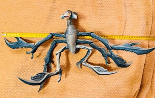 Muñeco dinosaurio articulado