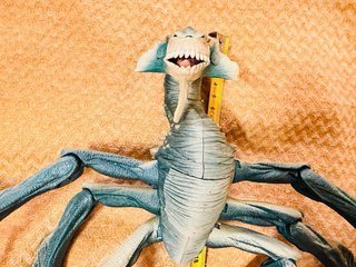 Muñeco dinosaurio articulado
