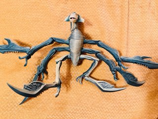 Muñeco dinosaurio articulado