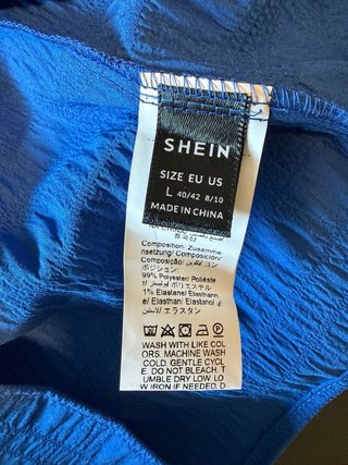 Blusa azul eléctrico con escote elástico