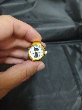 Anillo reloj gato negro dorado