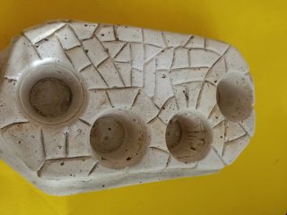 Portafiori in gesso effetto pietra