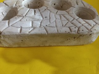 Portafiori in gesso effetto pietra