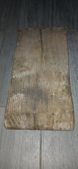 Tabla de lavar y rastrillo de madera