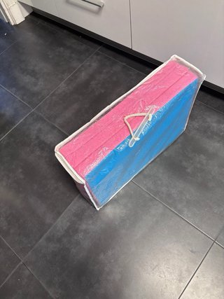 Cuna de viaje y colchón