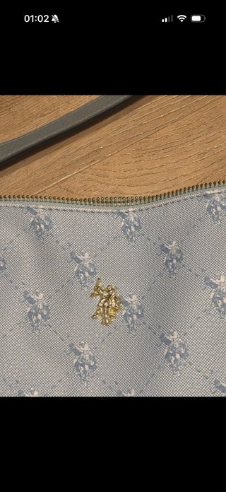 Bolso bandolera azul estampado