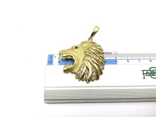 medalla oro 18k con piedra con circonita