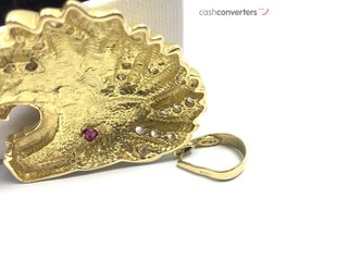 medalla oro 18k con piedra con circonita