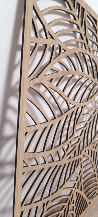 Cabecero de madera con diseño de hojas