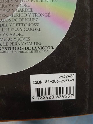 LIBRO TAPA DURA + CD - CARLOS GARDEL (LA VOZ DEL TANGO - RAFAEL FLORES)