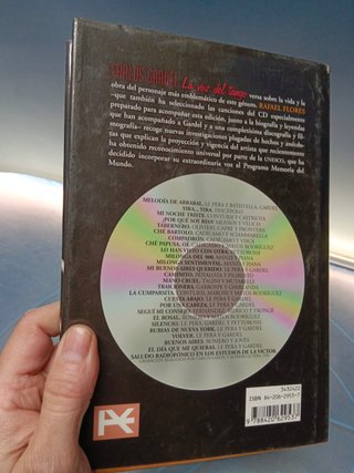 LIBRO TAPA DURA + CD - CARLOS GARDEL (LA VOZ DEL TANGO - RAFAEL FLORES)