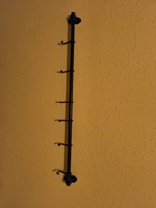 Colgador de pared metálico negro