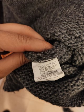 Jersey gris con cremallera