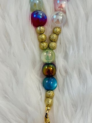 Rosario multicolor con cruz adornada
