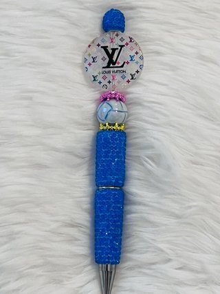 Bolígrafos de lujo con dijes de diseñador