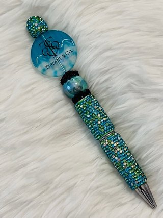 Bolígrafos de lujo con dijes de diseñador