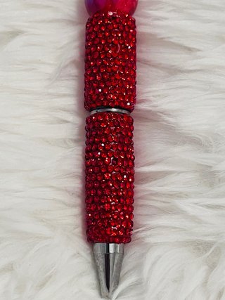 Bolígrafo zapato tacón rojo