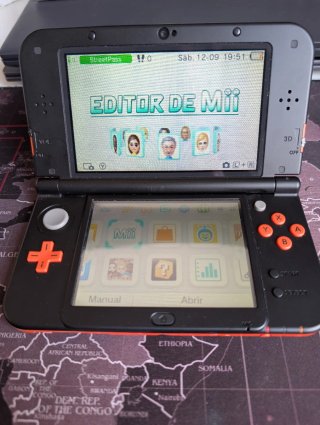 Nintendo 3DS XL Arancione + Caricatore + Pokémon Luna